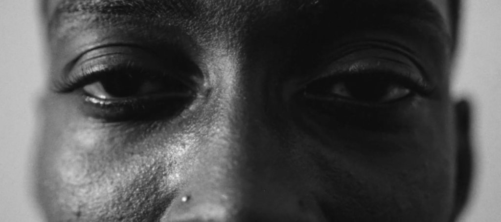 B&W closeup of Nas' eyes.
